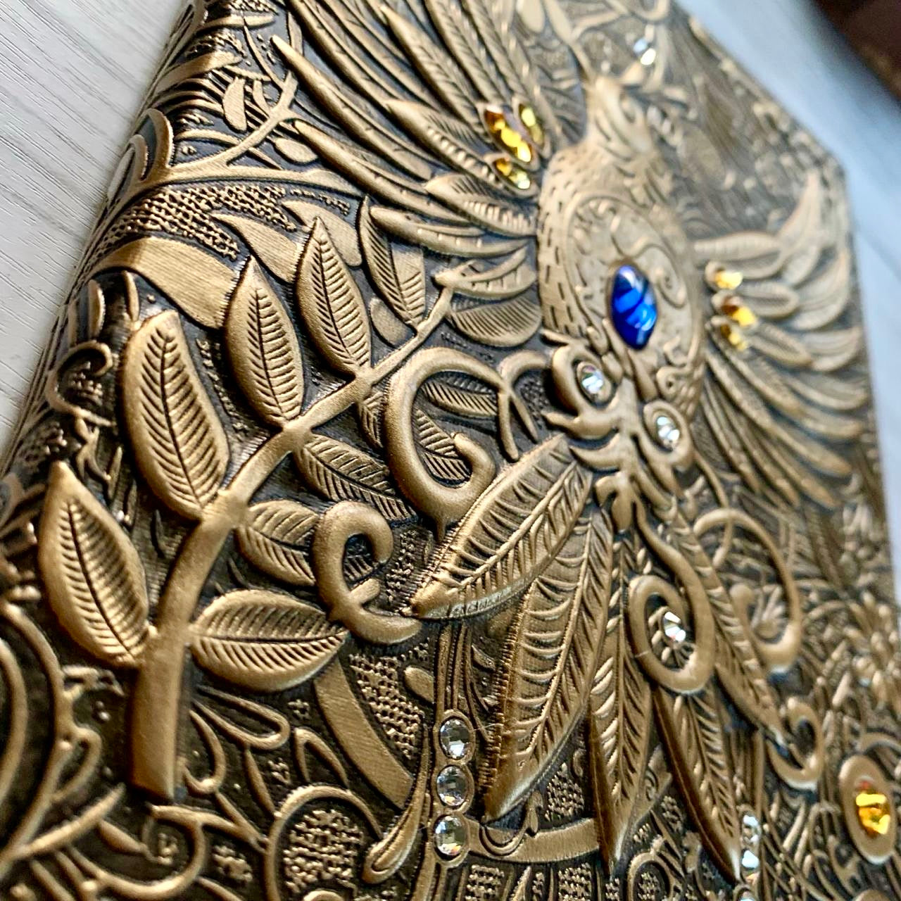Bird with stone Premium Notebook | Diary | golden