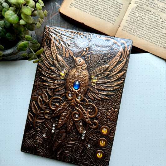 Bird with stone Premium Notebook | Diary |  copper