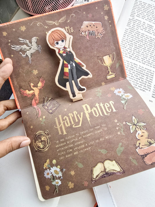 MG26610 | Harry Potter Inspired Lock Diary Featuring a Cartoon Ron Weasley Design And a Magnetic Snap Closure.