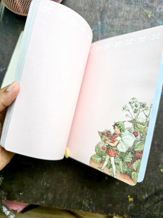 JZA5128-2557 |  Flower Fairies Notebook Features a Vibrant Illustration Titled The Sweet Pea Fairies By Cicely Mary Barker.