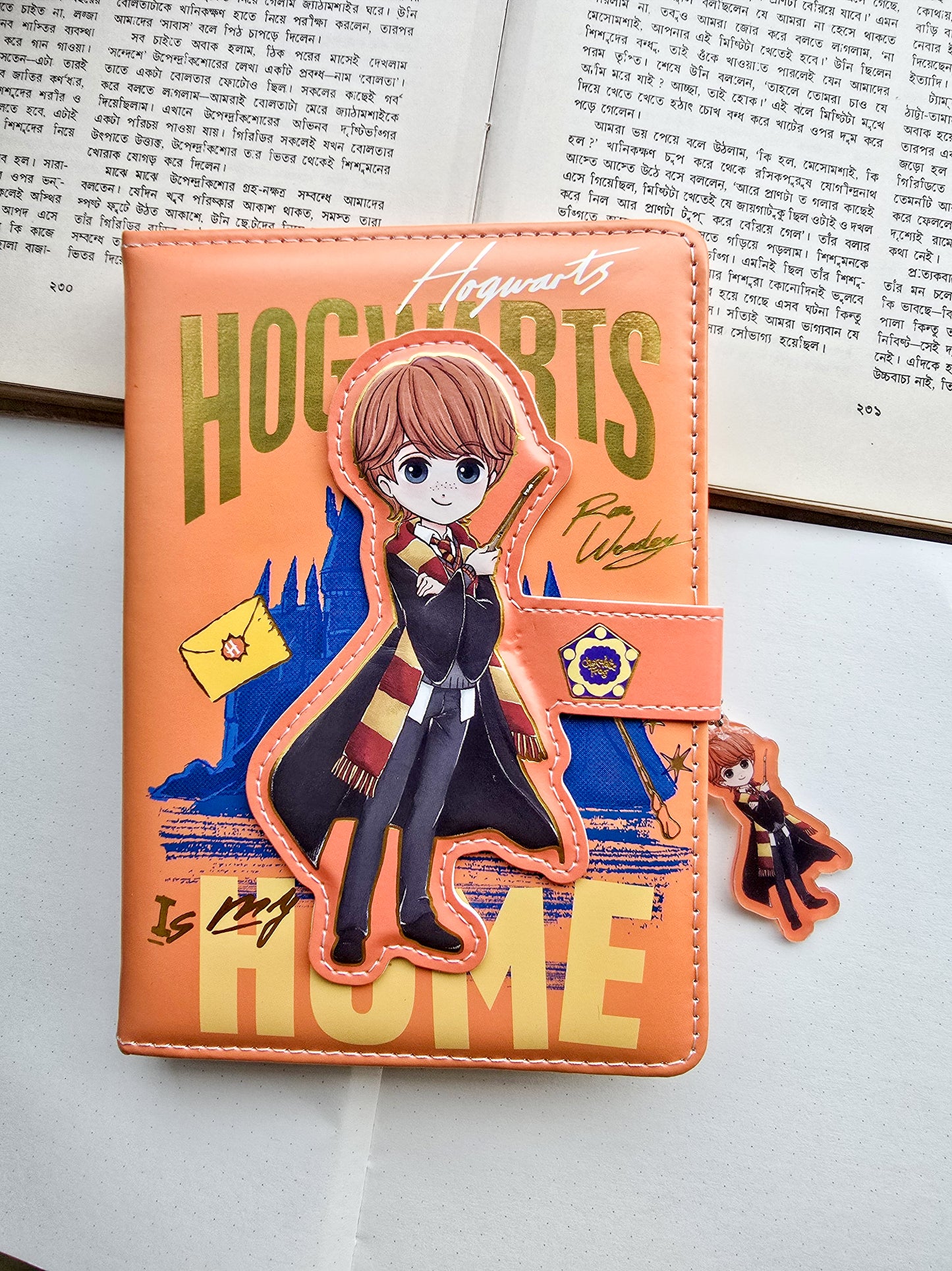MG26610 | Harry Potter Inspired Lock Diary Featuring a Cartoon Ron Weasley Design And a Magnetic Snap Closure.