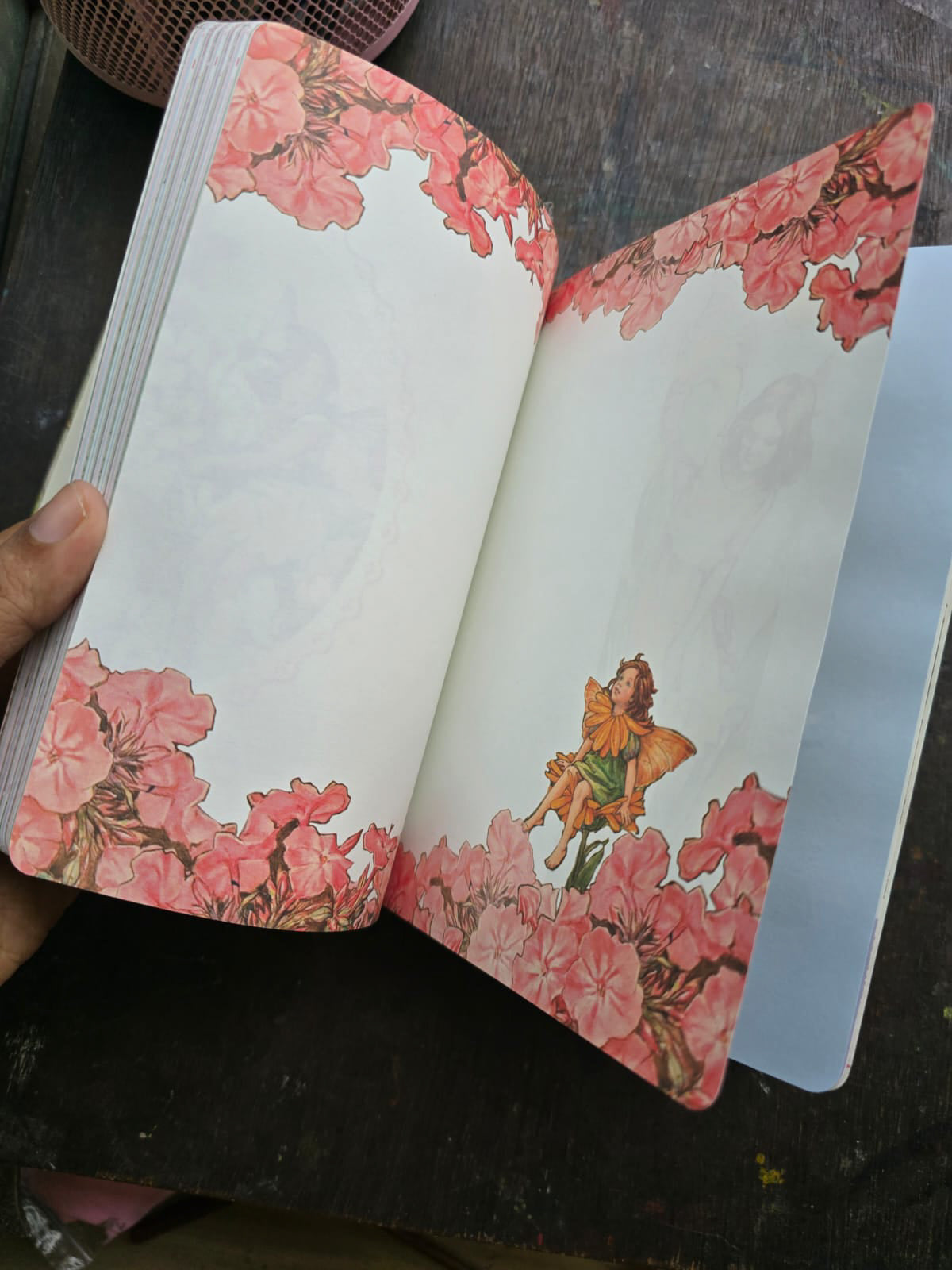 JZA5128-2557 |  Flower Fairies Notebook Features a Vibrant Illustration Titled The Sweet Pea Fairies By Cicely Mary Barker.